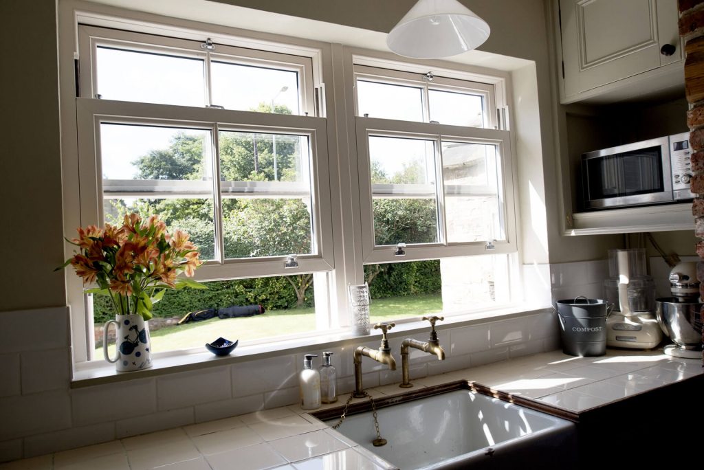uPVC white sliding sash windows in Essex.
